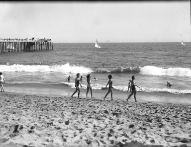 Models walking on the beach.