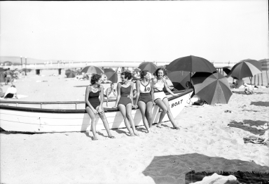 Medels sitting on a life boat.